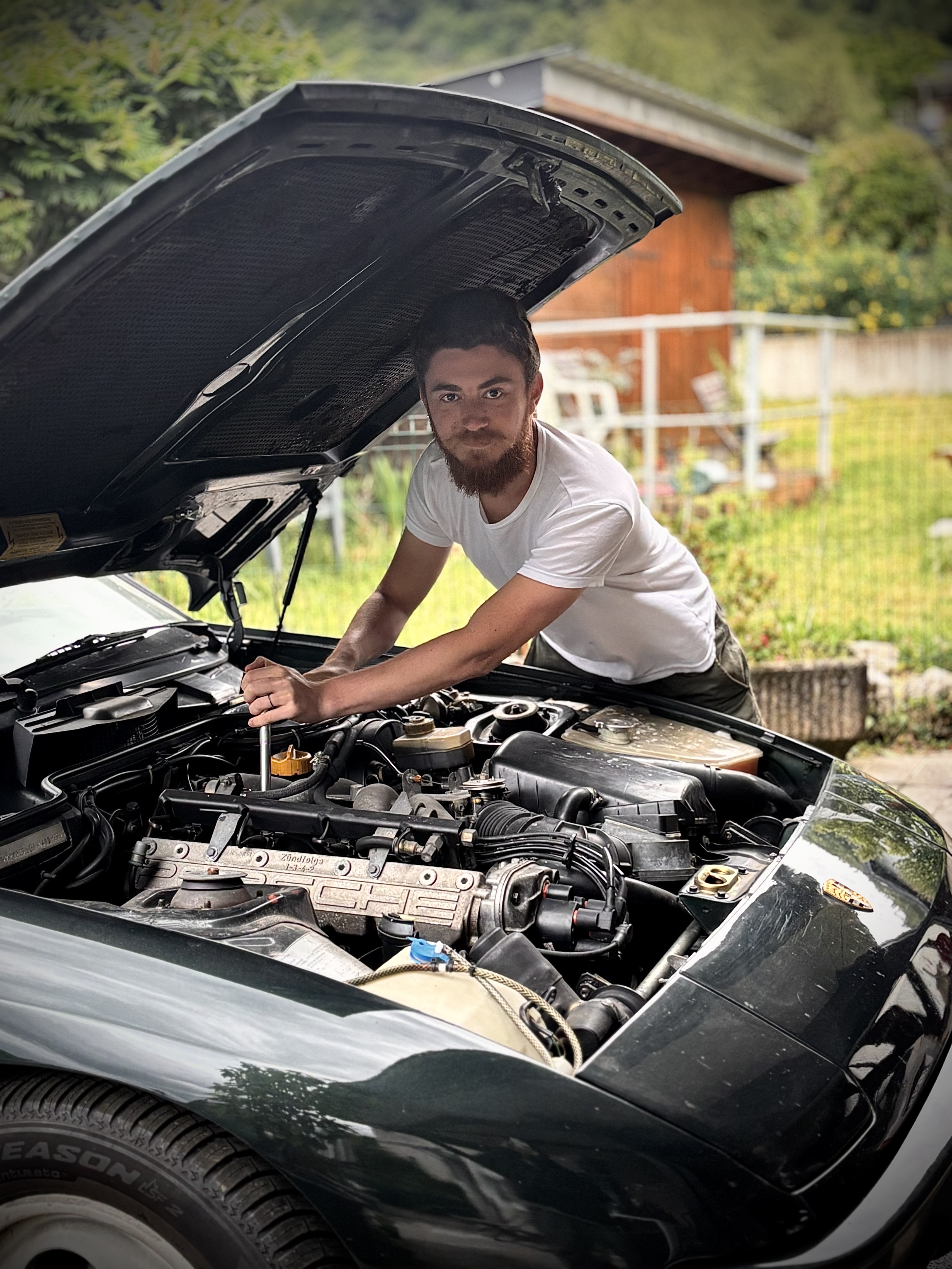 Yves working on his car.